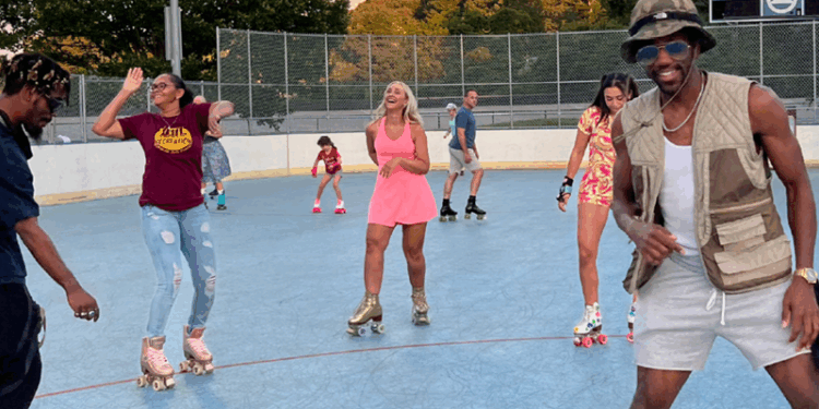 people skating on an outdoor rink