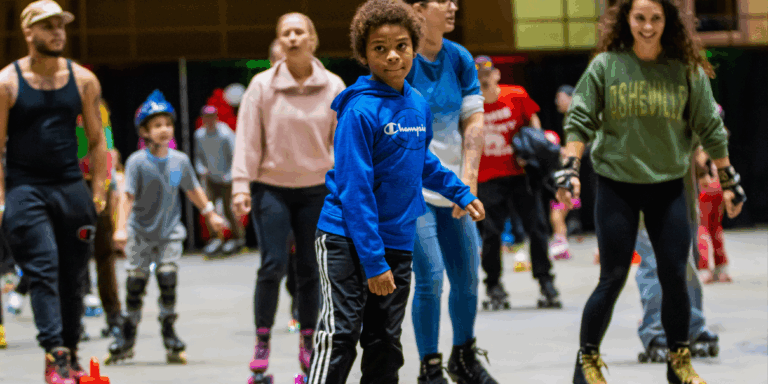 multiple people of all ages roller skating