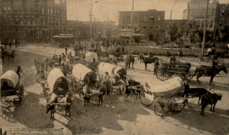 A photo from 1890 looking north shows horse-drawn wagons and electric streetcars. They would soon be joined by a growing use of “safety bicycles” and automobiles.