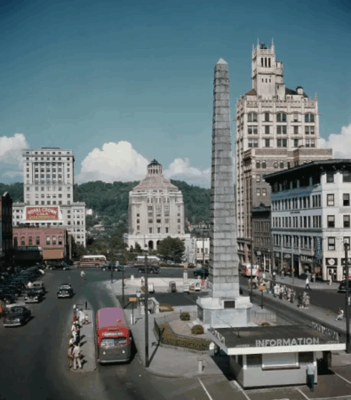 Personal automobiles and public transportation were integrated into everyday life by the mid-20th century. Buncombe County Courthouse and City Hall relocated to the east, creating City-Council Plaza with public greenspace that was dissected by a number of streets and parking spaces.