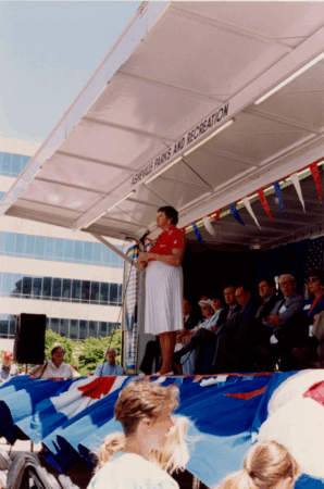 George and Phoebe Pack’s great-granddaughter Elizabeth Boggs spoke at the opening of Pack Place on July 4, 1992 with the Akzona Building in the background