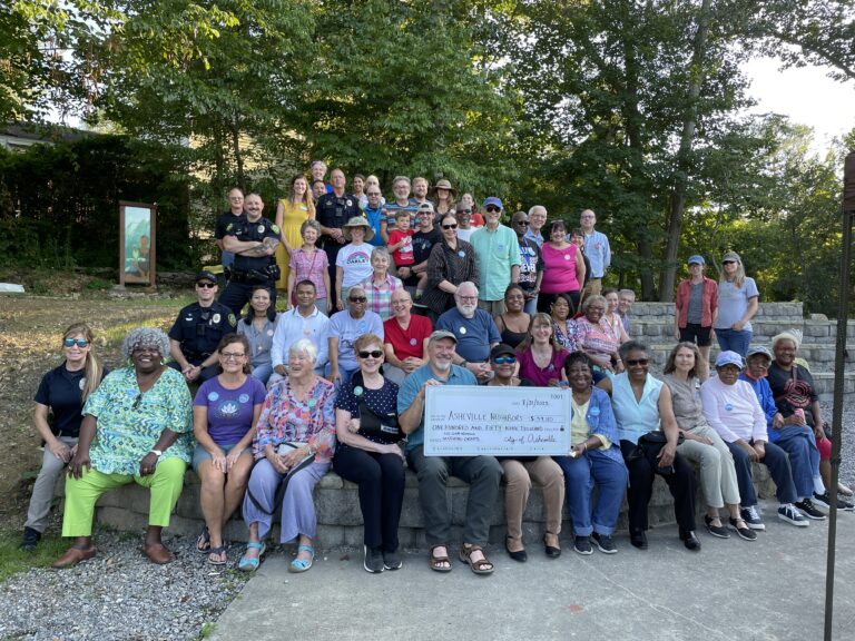 Neighborhood Matching Grant recipients with check in a group photo