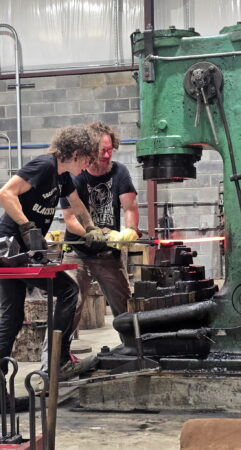 picture of an artist creating the sculpture