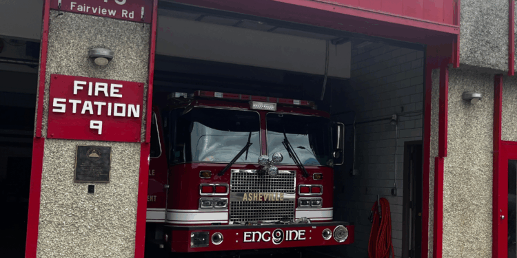 Open bay doors and engine in Fire station 9