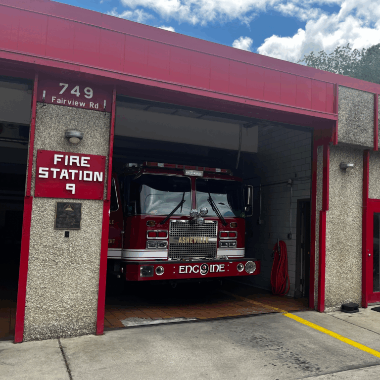 Open bay doors and engine in Fire station 9