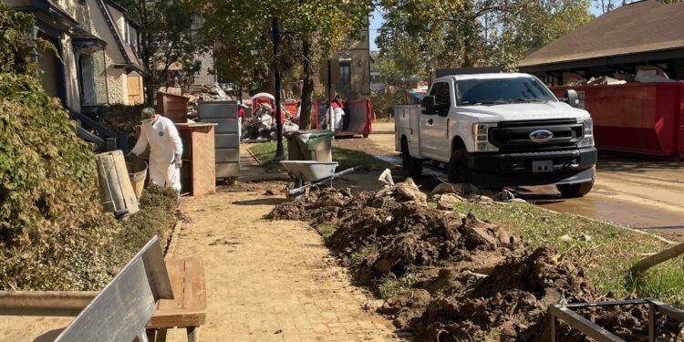 debris and mud on the sidewalks in Biltmore Village directly after Tropical Storm Helene
