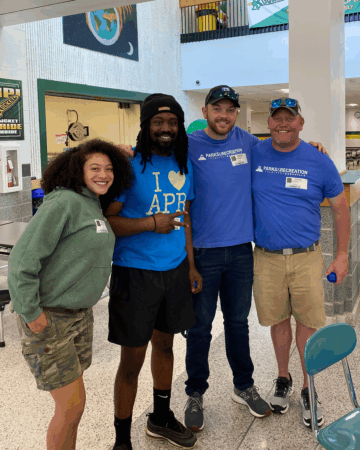 group of 4 Parks and Recreation employees