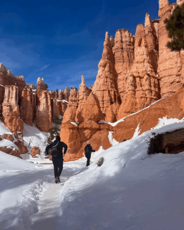 Eric Daggett hikes in the snow
