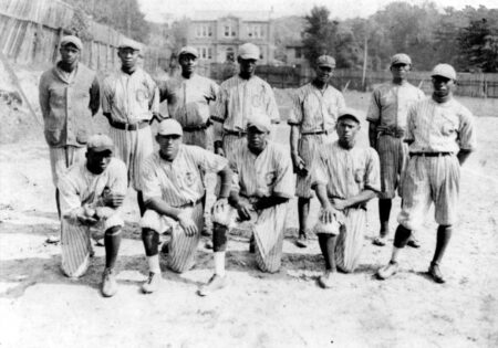 black and white photo of african american mens baseball team