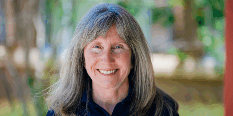 Parks & Recreation employee Tracy Wyman wearing a black shirt