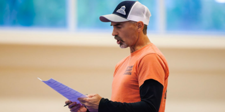 asheville parks and recreation program leader reading from a piece of paper