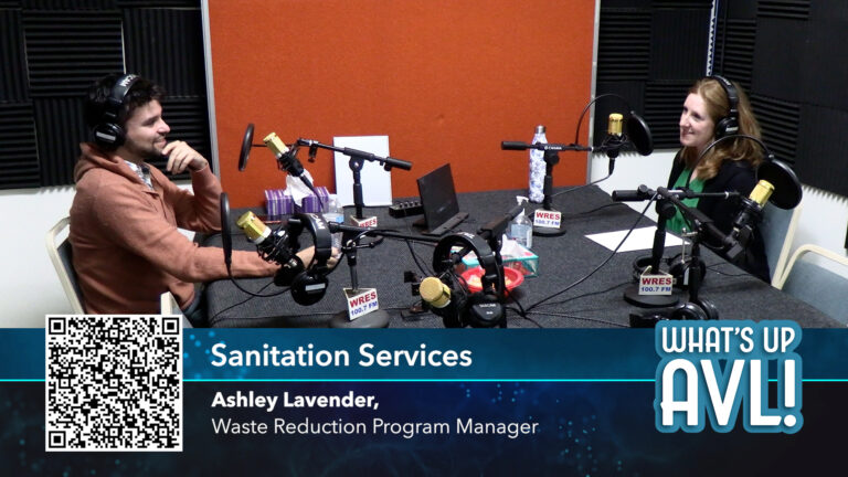 Sam and Ashley in studio in front of mics