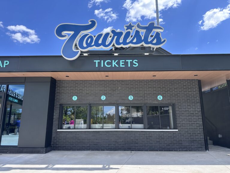 new ticket booth with tourists tickets sign