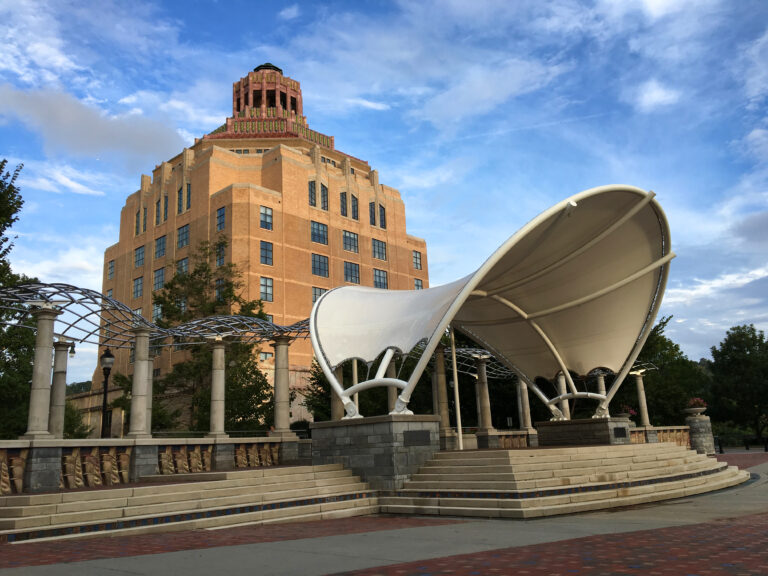 City hall building with band shelter in the foregound