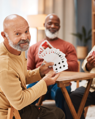 adults playing spades