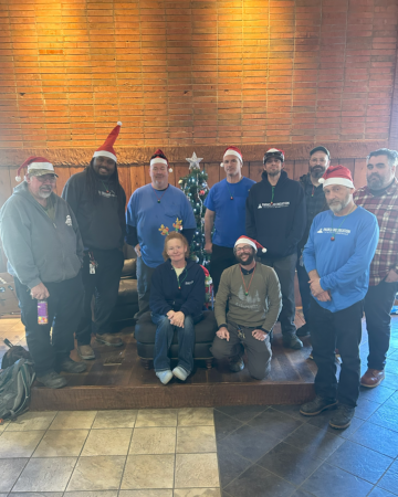 Will Ray and other Asheville Parks & Recreation employees at a holiday party