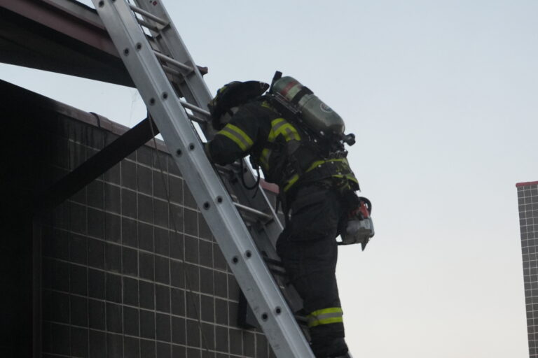 fire fighter climing ladder